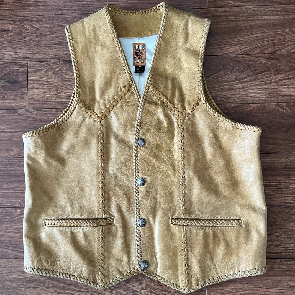 Men’s size large to extra-large leather vest by tribe, America, made in the USA.